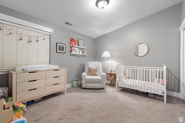 1692 E Kelmscott Ct S Unit C, Salt Lake City, UT 84124 - bedroom featuring carpet floors, a nursery area, and vaulted ceiling