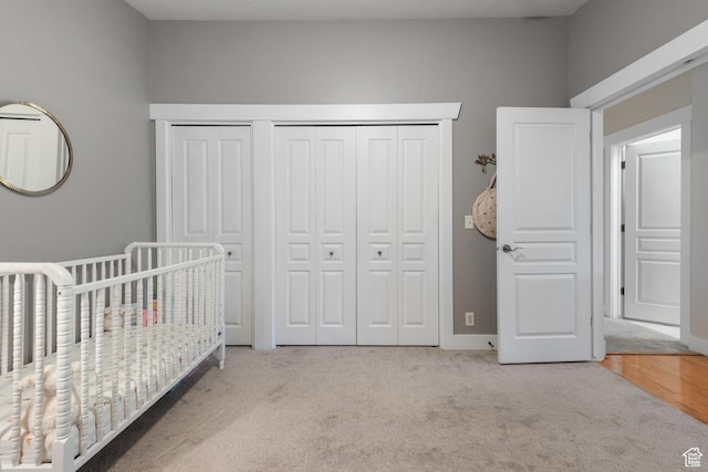 1692 E Kelmscott Ct S Unit C, Salt Lake City, UT 84124 - carpeted bedroom featuring a crib and baseboards