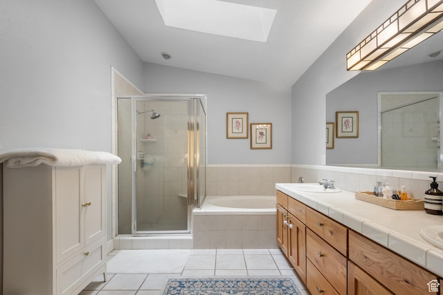 1692 E Kelmscott Ct S Unit C, Salt Lake City, UT 84124 - bathroom featuring a bath, tile patterned floors, double vanity, a stall shower, and lofted ceiling