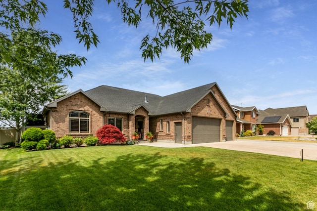 191 W Ranch Rd, Farmington, UT 84025 - view of front facade with brick siding, a garage, and a front lawn