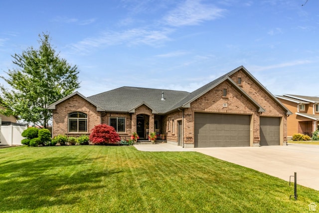 191 W Ranch Rd, Farmington, UT 84025 - view of front of home featuring brick siding, an attached garage, concrete driveway, and roof with shingles
