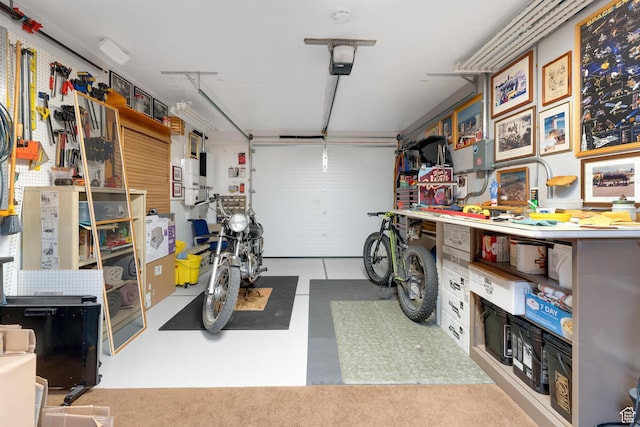 966 Mill Rd, Evanston, WY 82930 - garage featuring a garage door opener and a workshop area