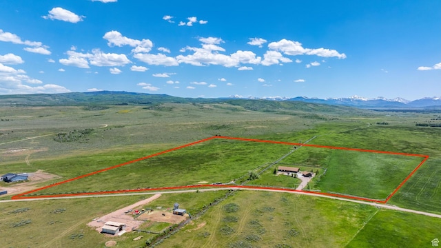 966 Mill Rd, Evanston, WY 82930 - view of rural area with a mountain backdrop and property boundaries highlighted