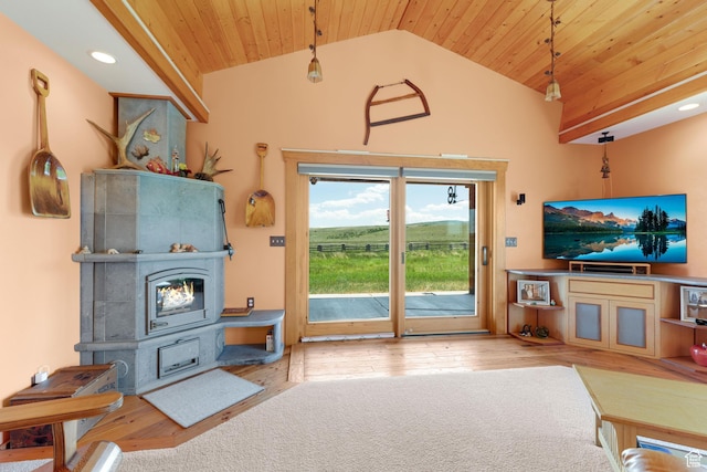 966 Mill Rd, Evanston, WY 82930 - living room with a wood stove, wooden ceiling, wood finished floors, high vaulted ceiling, and recessed lighting