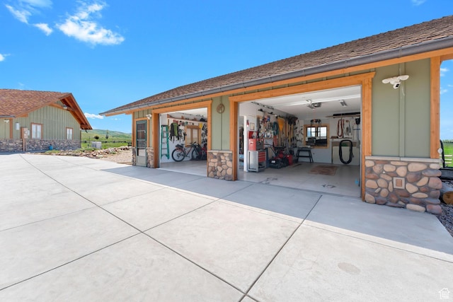 966 Mill Rd, Evanston, WY 82930 - garage featuring concrete driveway