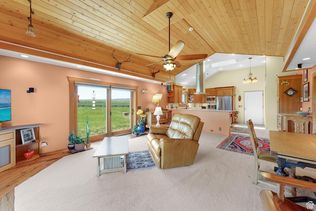 966 Mill Rd, Evanston, WY 82930 - living area featuring wood ceiling, lofted ceiling, recessed lighting, ceiling fan, and light carpet