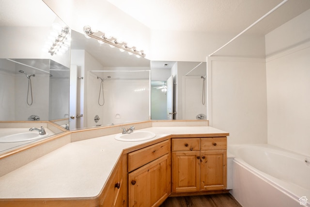 1735 W 540 N Unit 1303, St George, UT 84770 - bathroom featuring a bath, a shower, vanity, wood finished floors, and a ceiling fan
