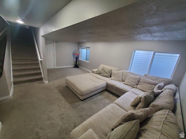 4973 E Oakwood Dr, Eagle Mountain, UT 84005 - carpeted living room featuring baseboards and stairway