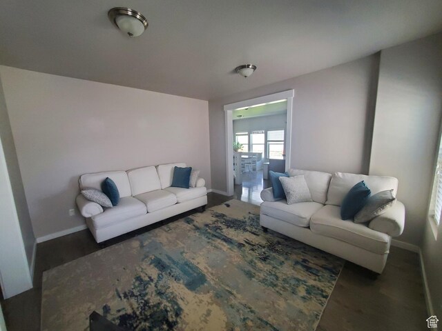 4973 E Oakwood Dr, Eagle Mountain, UT 84005 - living area with baseboards and wood finished floors