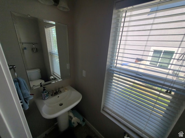 4973 E Oakwood Dr, Eagle Mountain, UT 84005 - bathroom featuring baseboards
