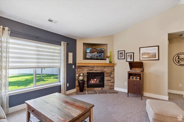 210 E 2150 N, North Ogden, UT 84414 - carpeted living area featuring lofted ceiling, a fireplace, and a textured ceiling