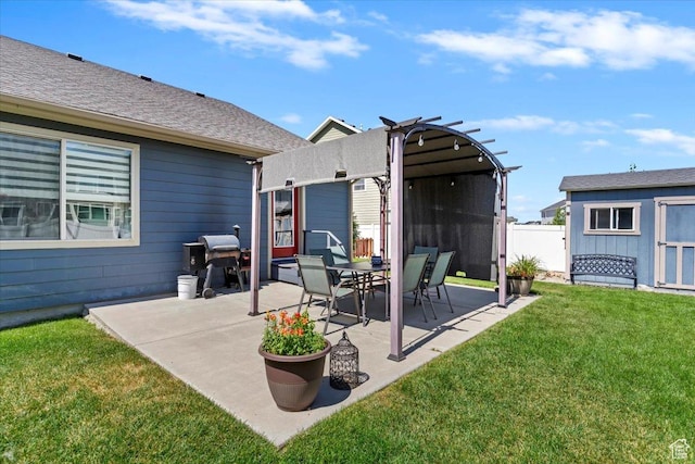 210 E 2150 N, North Ogden, UT 84414 - view of patio featuring area for grilling, a pergola, and an outbuilding