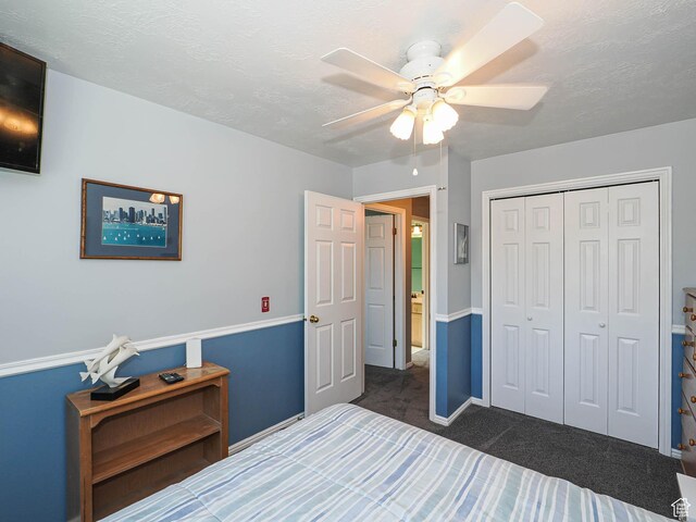 1402 E Valley Ridge Dr S, Sandy, UT 84093 - bedroom with dark carpet, a closet, a ceiling fan, and a textured ceiling