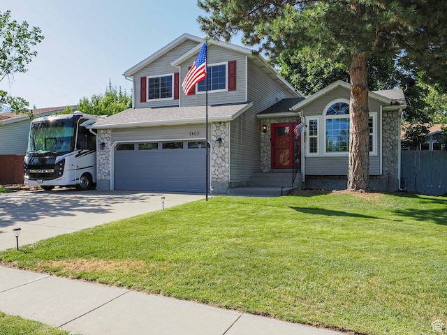 1402 E Valley Ridge Dr S, Sandy, UT 84093 - view of front of home featuring stone siding, a garage, and driveway