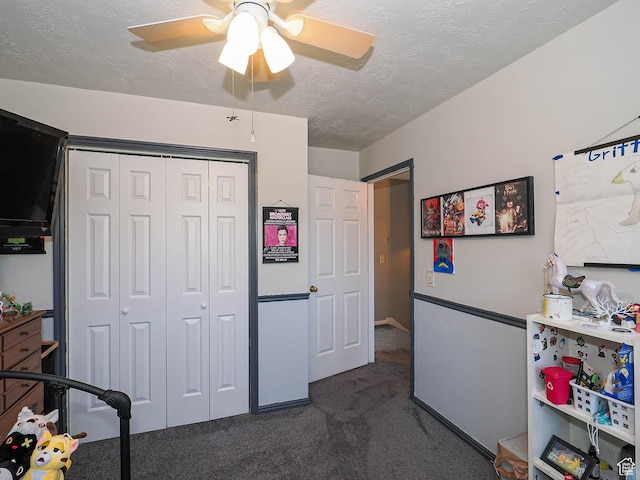 1402 E Valley Ridge Dr S, Sandy, UT 84093 - bedroom with dark colored carpet, a textured ceiling, a closet, and ceiling fan