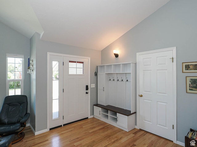1402 E Valley Ridge Dr S, Sandy, UT 84093 - mudroom with lofted ceiling, light wood finished floors, and healthy amount of natural light