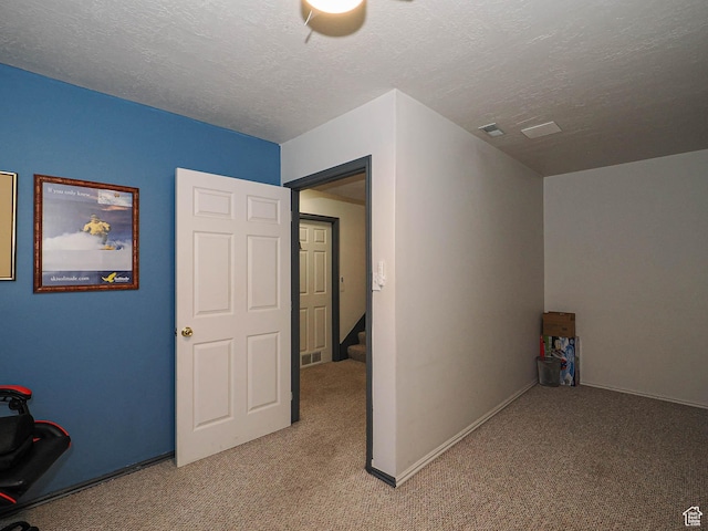 1402 E Valley Ridge Dr S, Sandy, UT 84093 - additional living space with light carpet, a textured ceiling, and stairs