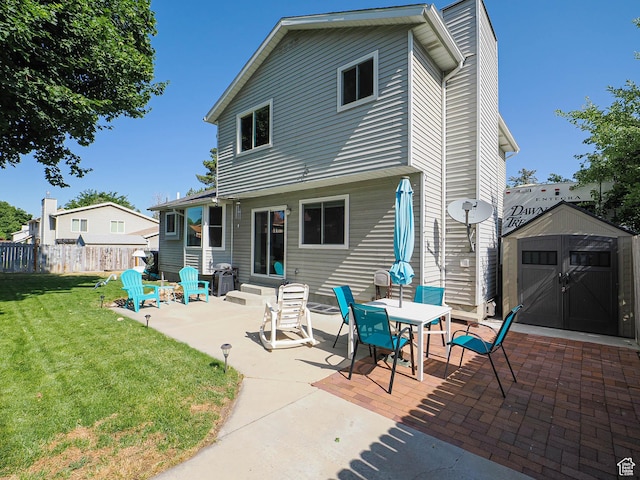 1402 E Valley Ridge Dr S, Sandy, UT 84093 - back of property featuring a patio area, a storage unit, and entry steps