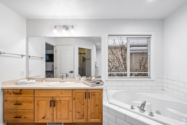 93 S 1250 E, Logan, UT 84321 - bathroom featuring a garden tub and vanity