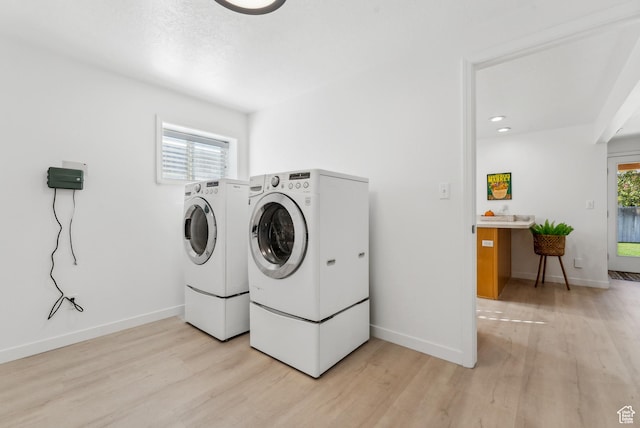 93 S 1250 E, Logan, UT 84321 - laundry room with separate washer and dryer and light wood-type flooring