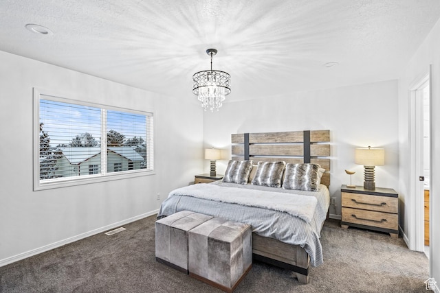 93 S 1250 E, Logan, UT 84321 - carpeted bedroom featuring a chandelier and a textured ceiling