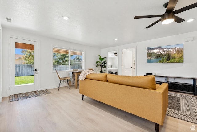 93 S 1250 E, Logan, UT 84321 - living room with light wood-style flooring, a ceiling fan, and recessed lighting