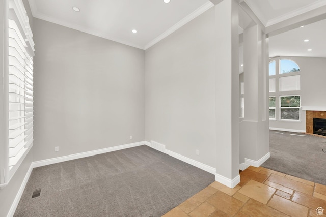3179 W Hayden Ridge Way S, Riverton, UT 84065 - carpeted empty room featuring stone tile floors, recessed lighting, a tile fireplace, and ornamental molding