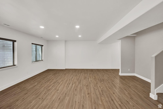 3179 W Hayden Ridge Way S, Riverton, UT 84065 - basement featuring wood finished floors, recessed lighting, and stairs