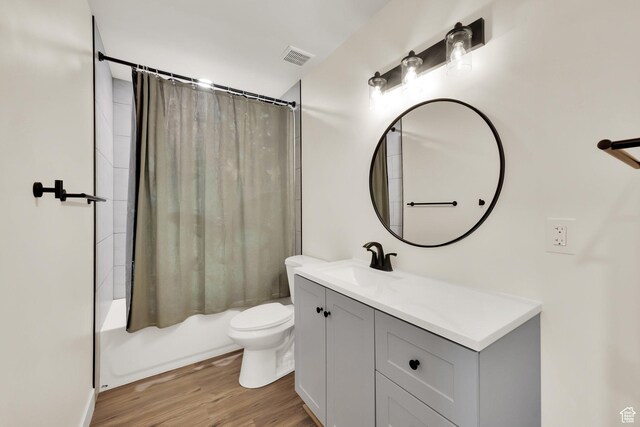3179 W Hayden Ridge Way S, Riverton, UT 84065 - full bathroom with vanity, shower / bath combination with curtain, and wood finished floors