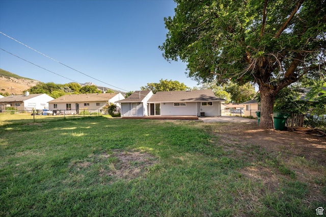 1302 E Harrop S, Ogden, UT 84404 - back of property featuring a deck with mountain view
