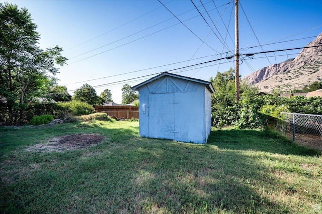 1302 E Harrop S, Ogden, UT 84404 - fenced backyard with a storage unit