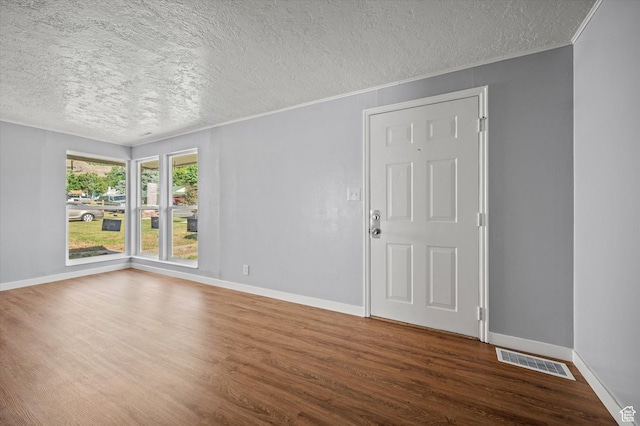 1302 E Harrop S, Ogden, UT 84404 - spare room with a textured ceiling and wood finished floors