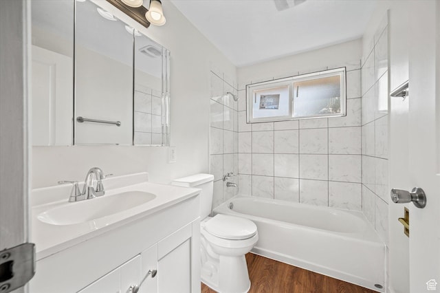 1302 E Harrop S, Ogden, UT 84404 - bathroom with wood finished floors, vanity, and shower / bath combination