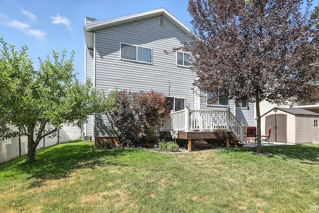 433 W 2425 N, Harrisville, UT 84414 - rear view of property with a storage shed, a wooden deck, and a chimney