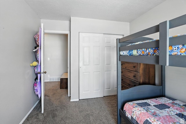 433 W 2425 N, Harrisville, UT 84414 - carpeted bedroom featuring a closet and a textured ceiling