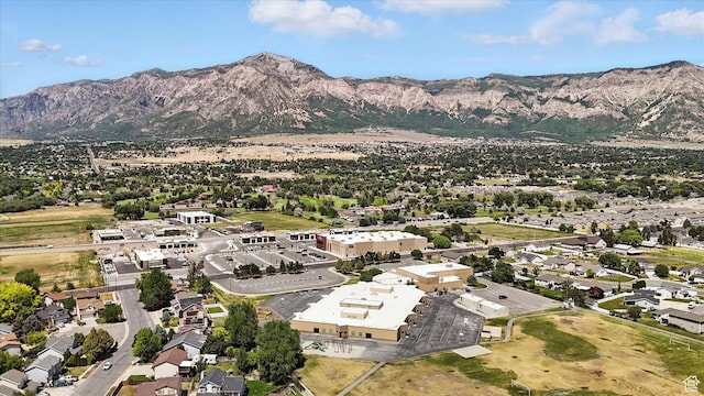 433 W 2425 N, Harrisville, UT 84414 - aerial overview of property's location featuring a mountain backdrop and nearby suburban area