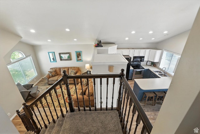 433 W 2425 N, Harrisville, UT 84414 - stairway with recessed lighting, plenty of natural light, and wood finished floors