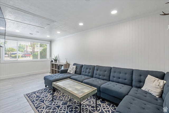 104 E 650 N, Bountiful, UT 84010 - living area with wood finished floors, crown molding, recessed lighting, and a textured ceiling