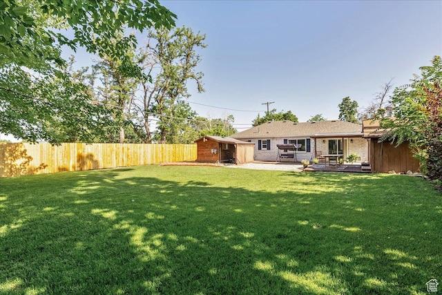 104 E 650 N, Bountiful, UT 84010 - view of yard featuring an outbuilding and a patio