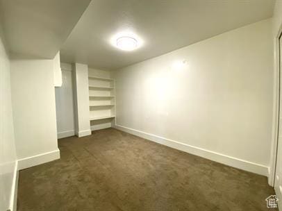 1309 E Hidden Creek Ct S, Holladay, UT 84117 - unfurnished bedroom with dark colored carpet and a closet