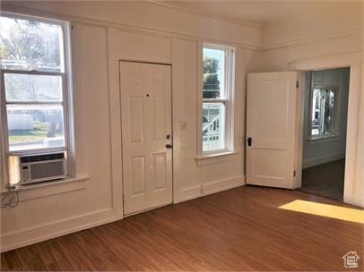 1309 E Hidden Creek Ct S, Holladay, UT 84117 - entryway featuring dark wood-style floors and cooling unit