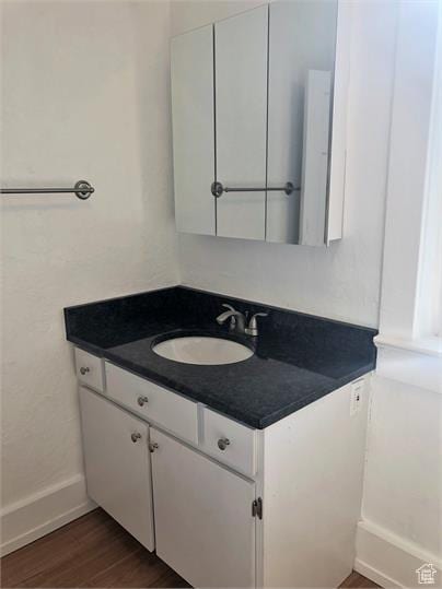 1309 E Hidden Creek Ct S, Holladay, UT 84117 - bathroom with vanity and wood finished floors