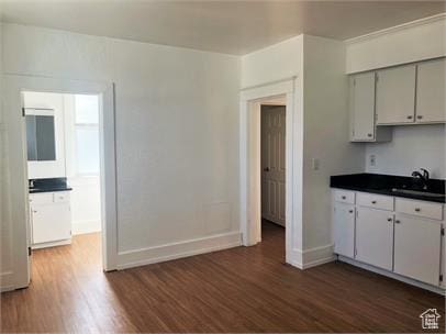 1309 E Hidden Creek Ct S, Holladay, UT 84117 - kitchen with dark wood finished floors and dark countertops