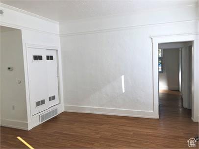 1309 E Hidden Creek Ct S, Holladay, UT 84117 - spare room featuring baseboards and wood finished floors