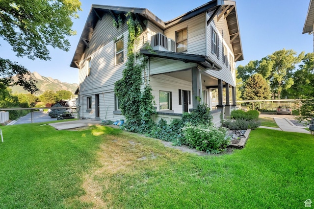1309 E Hidden Creek Ct S, Holladay, UT 84117 - view of property exterior featuring a mountain view and a patio area