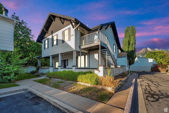 1309 E Hidden Creek Ct S, Holladay, UT 84117 - view of front of home featuring covered porch and stairs