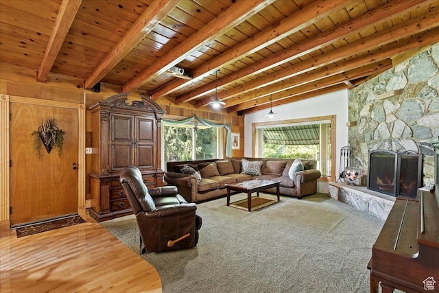 2391 Kays Creek Dr, Layton, UT 84040 - living room with a wooden ceiling with exposed beams, wood finished floors, and a fireplace