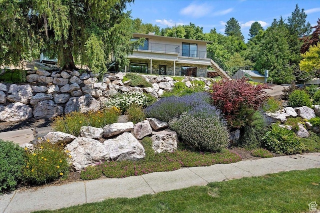 2391 Kays Creek Dr, Layton, UT 84040 - view of front of house with a balcony