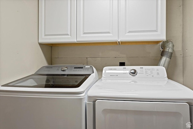 2391 Kays Creek Dr, Layton, UT 84040 - washroom with cabinet space and washer and clothes dryer
