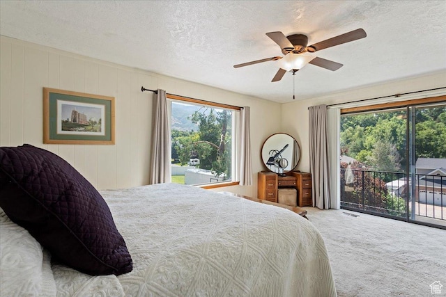 2391 Kays Creek Dr, Layton, UT 84040 - bedroom with access to outside, carpet floors, a textured ceiling, and ceiling fan